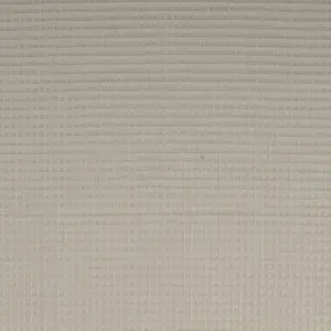 Grau gewaffelter Piqué-Stoff mit einer strukturierten Oberfläche, die kleine quadratische Muster zeigt.