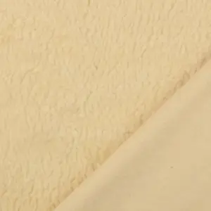 Uni Wollstoff in Wollweiß mit einer weichen, strukturierten Oberfläche und glatter Rückseite.